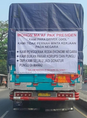 Ketika Truk Menjadi Papan Pengumuman Negara yang Sakit  Membaca Spanduk Sopir ODOL dalam Perspektif Linguistik Lanskap